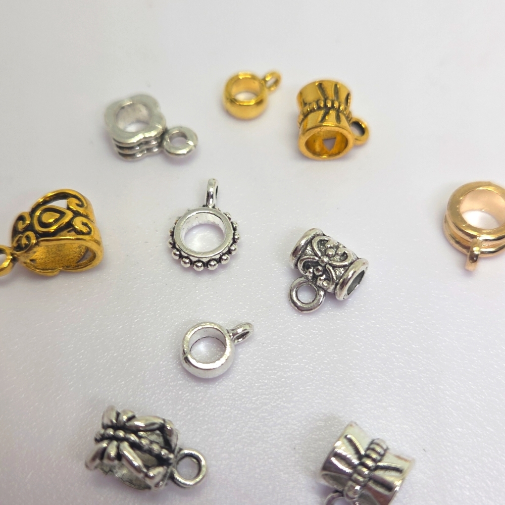 Assorted Gold And Silver Metal Bails for Adding Charms To Your Projects.